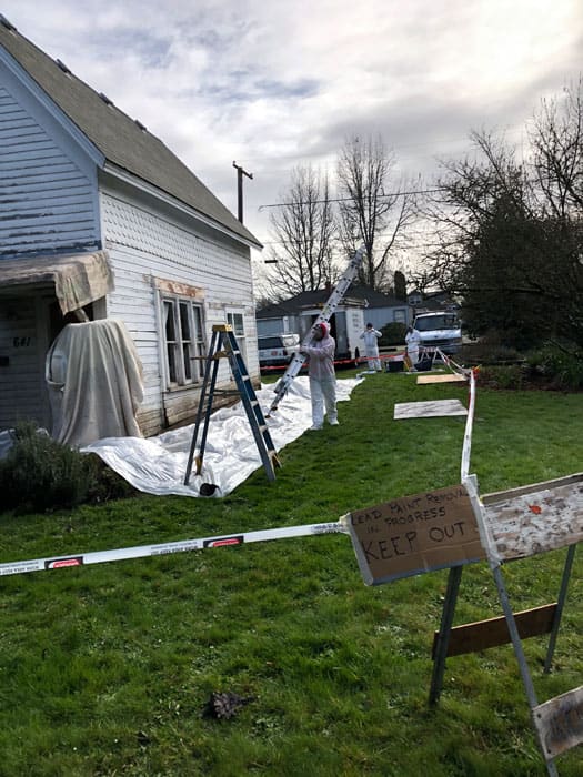 Suiting up for Lead Paint Removal in downtown Corvallis